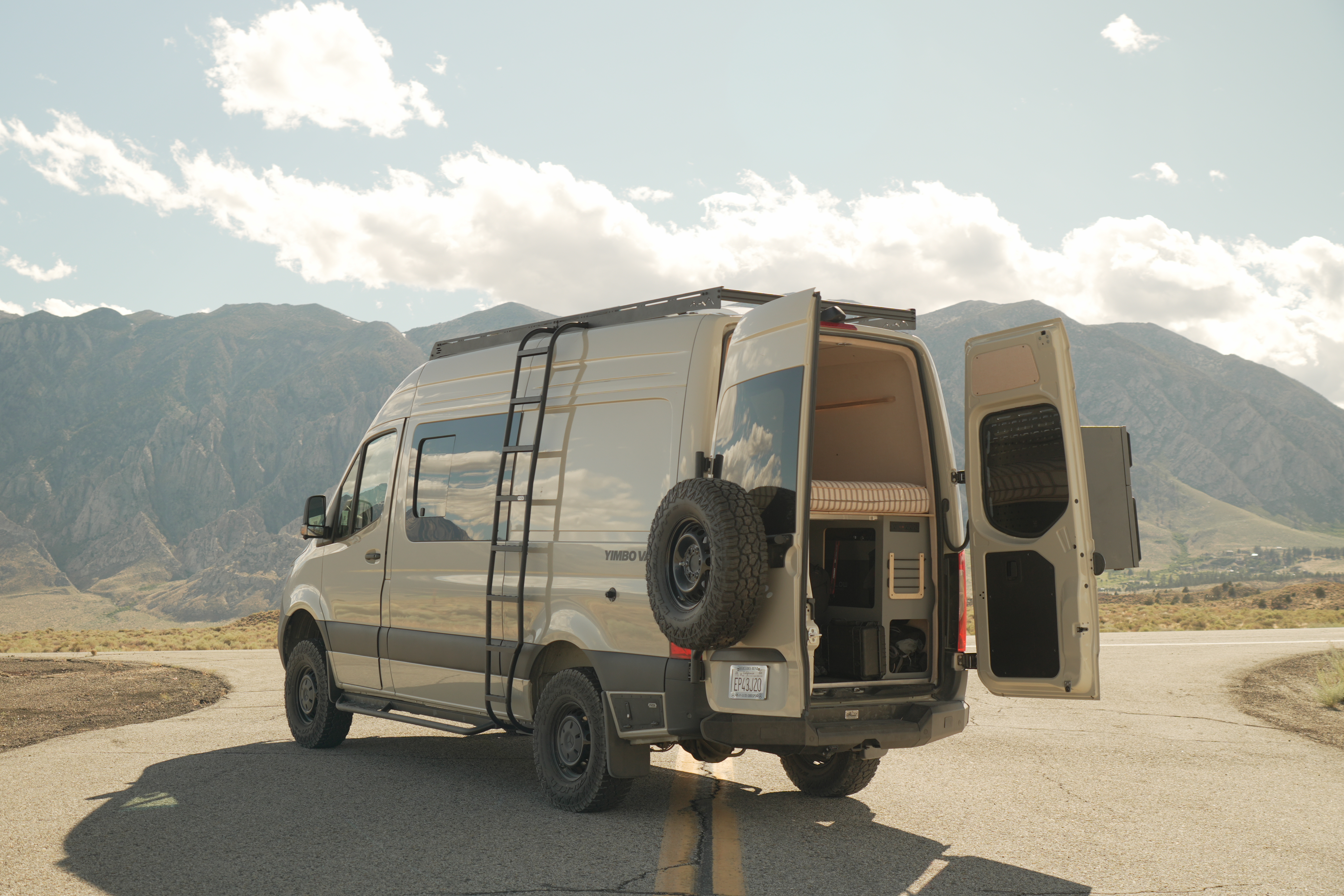 Yimbo Vans custom adventure van in the mountains
